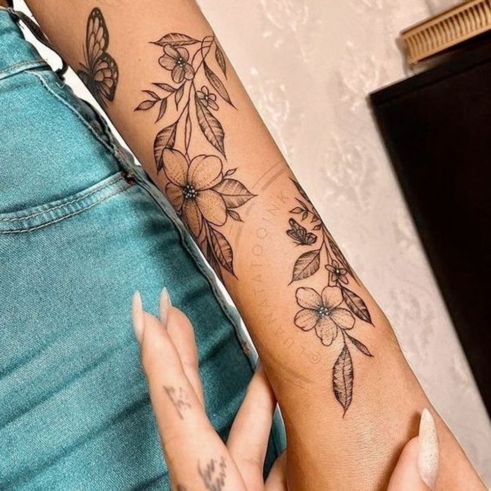 Tatuagem feminina no braço